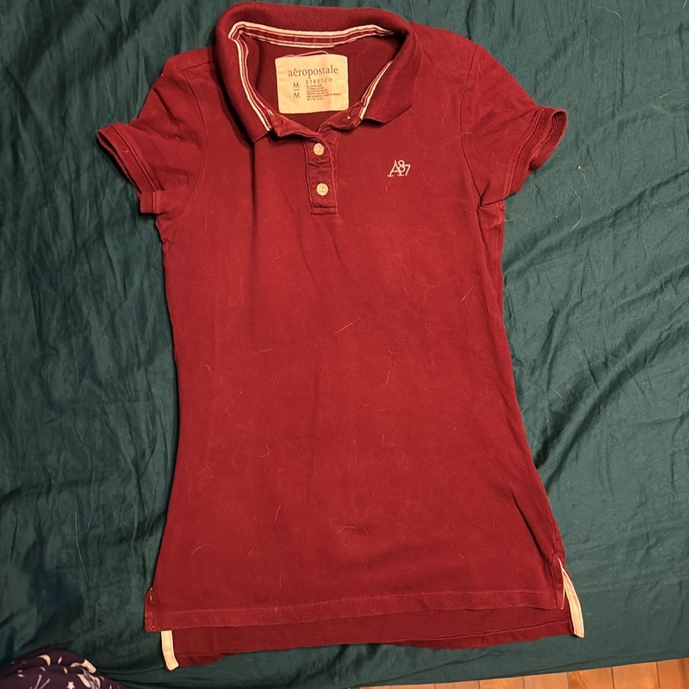 Aeropostale maroon polo in size M.